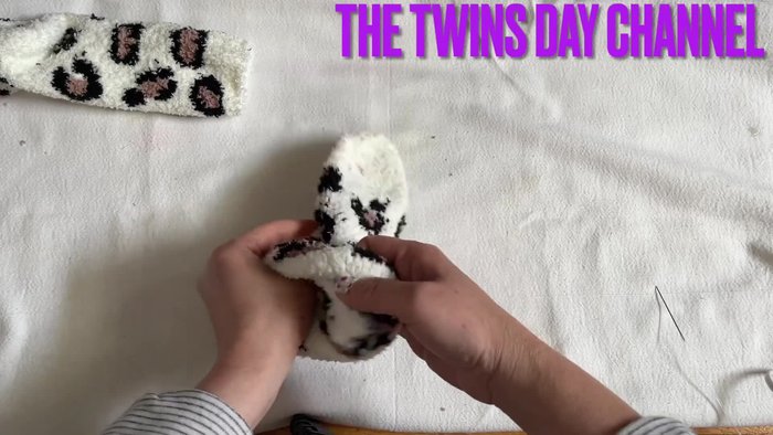 Prepare the socks. Take out one sock and lay it flat.