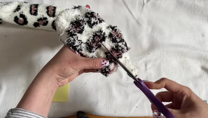 Cut and separate the leg pieces. Cut around the beige section to separate the legs.