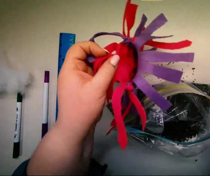 Stuff the toy through the open side, adding as much or as little as desired.