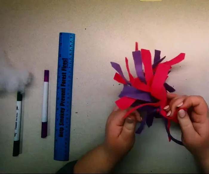 Double knot the remaining strips to close the opening.