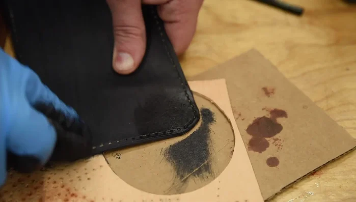 Round off the corners of the flap where the snaps will go.