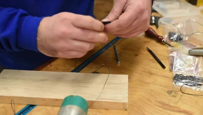 Saddle stitch the leather pieces together, using an inside-to-inside stitch.