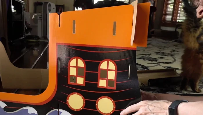 Assemble the main body of the pirate ship following the instructions.