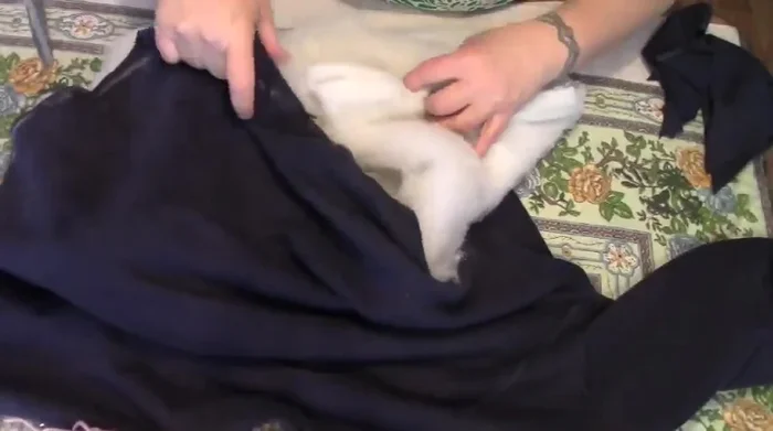 Take a few stitches to hold the bottom closed temporarily.