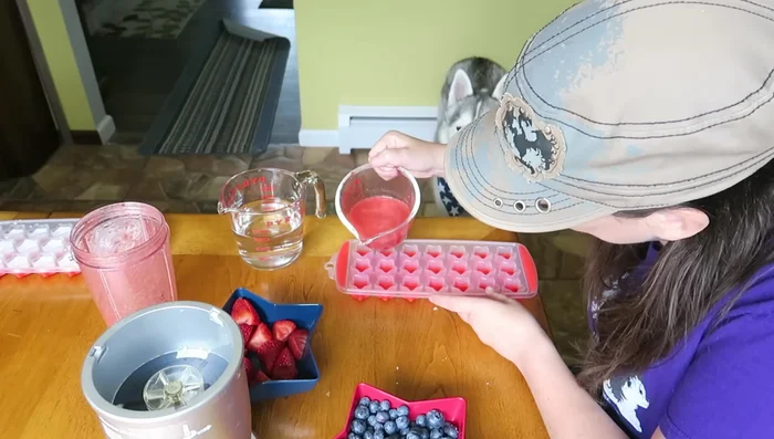 Pour the mixture into a star-shaped ice cube tray.