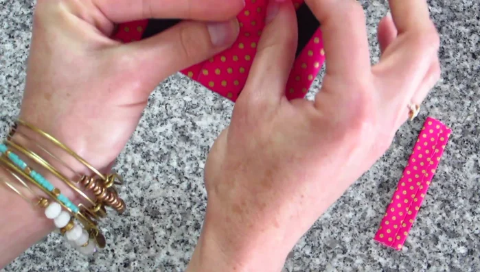 Secure the Bow: Fold the Velcro-attached edges to the center, overlapping them, and stitch down to secure.