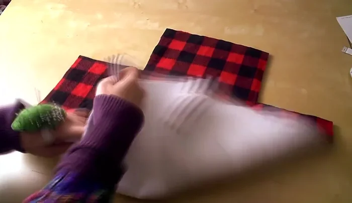 Sew gussets: Sew the gussets on both the lining and main fabric pieces, leaving one gusset on the lining fabric half-sewn to allow for turning.