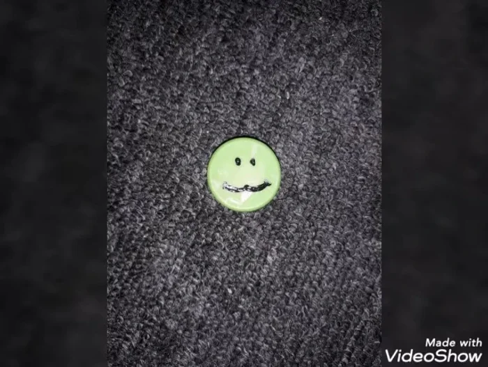 Make a Frog: Use a green bottle cap. Add two dots for the eyes, a 'w' for the smile, and two small circles for the eyes.
