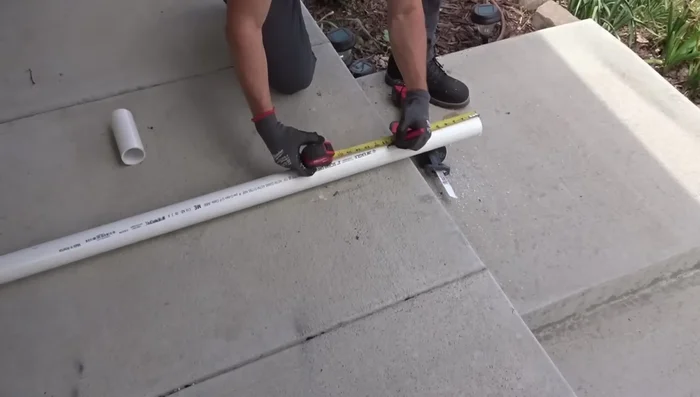 Drill a hole in the center of the PVC caps.