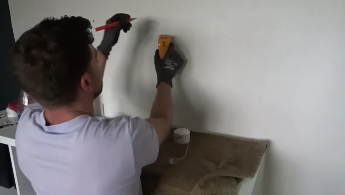 Secure a lag screw through a PVC cap into the stud.