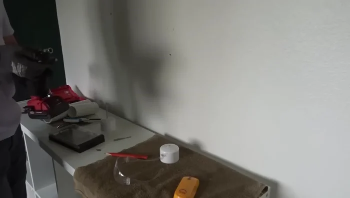 Secure a lag screw through a PVC cap into the stud.