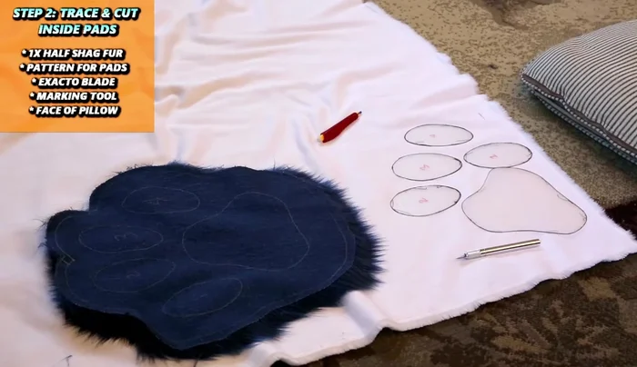 Trace and cut out the inside pads using the shorter pile fur, pad pattern, exacto blade, and marking tools. Also cut out the face of the pillow.