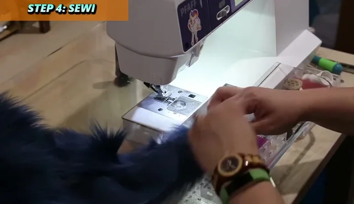 Brush out the seams and then pin and sew in the remaining smaller pads one at a time. Pin at the corners first, then fill in.