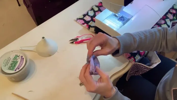 Clip curves (optional, but helps create a rounder shape) and turn the fabric right side out. Use a poking tool to push out corners.