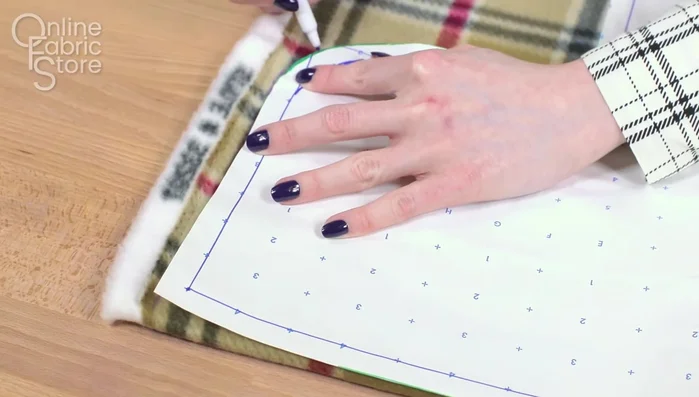 Cut fabrics: Cut out the body and collar pieces from the outer fabric (fleece), lining fabric (Sherpa), and nylon fabric. If making a harness opening, mark and cut that on all three layers.