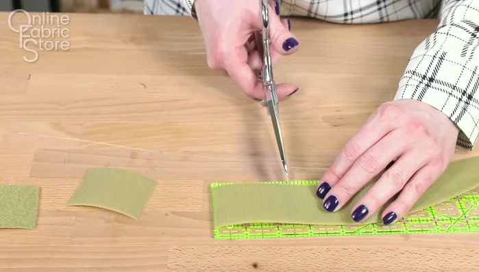 Attach Velcro: Sew Velcro to the lining and fleece straps.