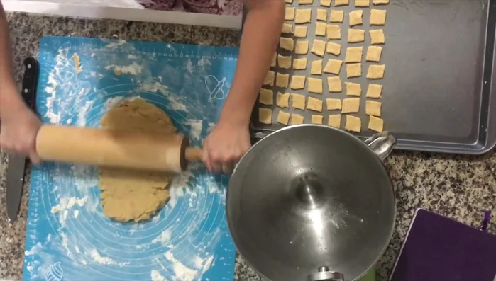 Repeat steps 3 & 4: Repeat the rolling and cutting process for the second section of dough.