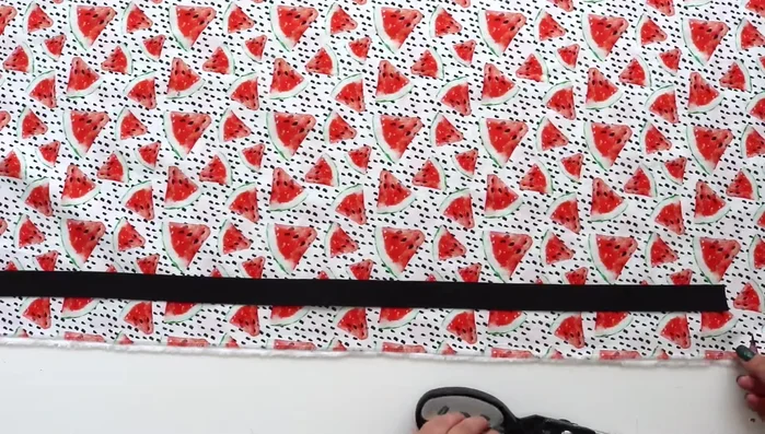 Flip the fabric, press along the basting stitch towards the fold, and remove the basting stitch.