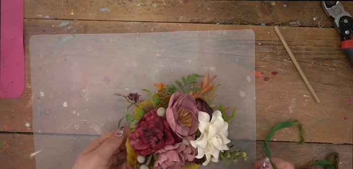 Attach thin ribbon or wire to both ends of the crown for tying and adjustability.