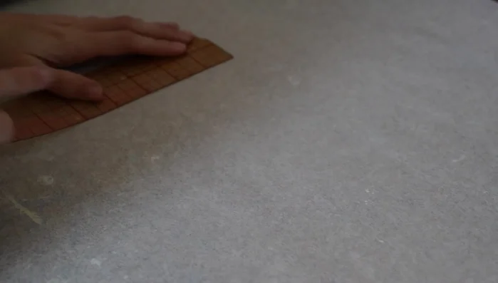 Add Bat Wings to the Pattern: Draw the bat wing shapes onto the pattern, including lines for decorative stitching and seam allowance.