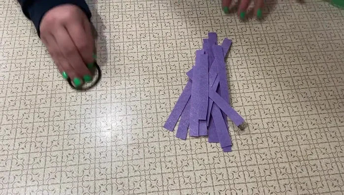 Repeat step 5 until the hair tie is full.