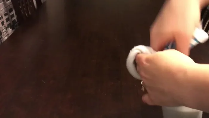 Tie a knot in the sock.