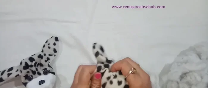 Add finishing touches and decorative stitches.