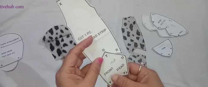 Sew the face details together.