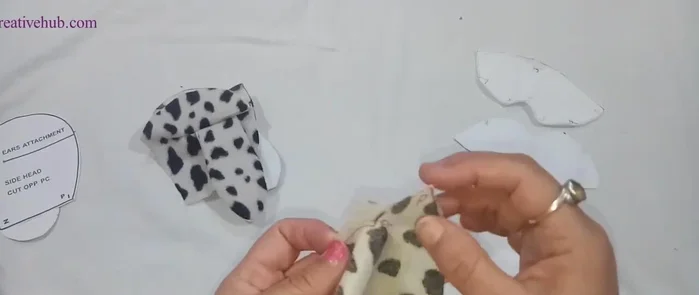 Sew the face details together.