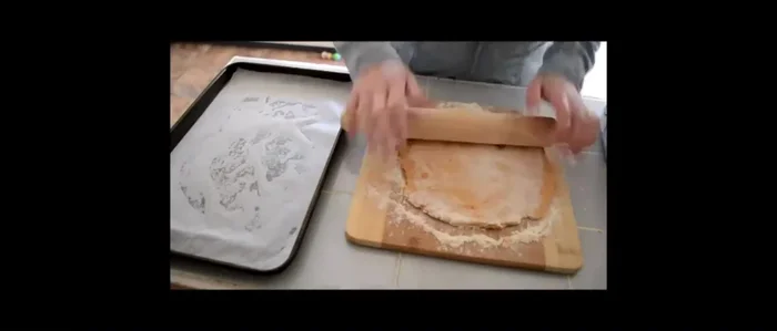 Cut the dough into shapes using a cookie cutter or knife.