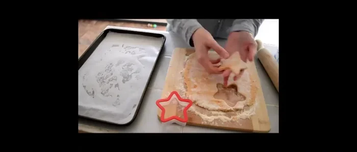 Cut the dough into shapes using a cookie cutter or knife.