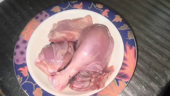 Gather your ingredients: Chicken with skin and bones (aim for at least one bone for optimal broth richness).