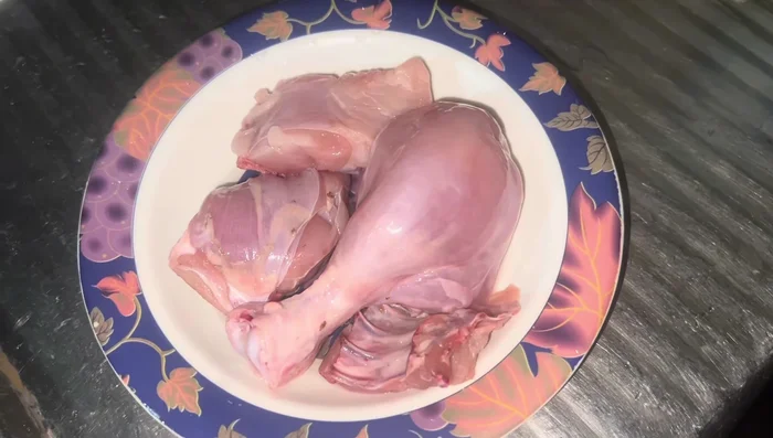 Simmer the chicken on low heat for approximately 1.5 hours to allow the broth to extract maximum nutrients and oil from the bones.