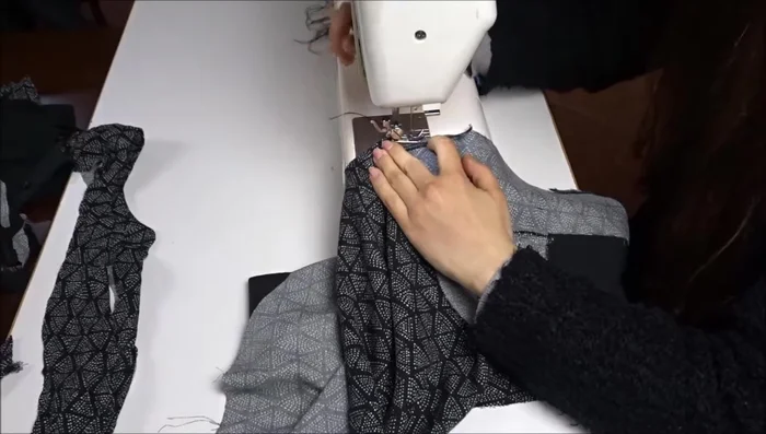 Attach the side band to the top and bottom parts of the cover, right sides together, leaving a gap for turning and inserting the bed.