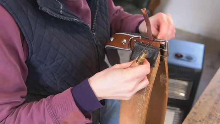 Stitch the collar: Double hand-stitch the collar, paying attention to securing the d-ring and buckle ends.