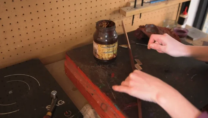 Stain and crease the leather.