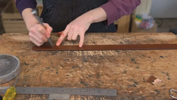 Edge the back of the holes using a number six edged tool.