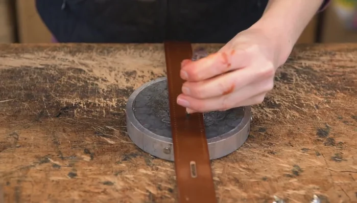 Punch holes for studs using a sharp awl or screwdriver.