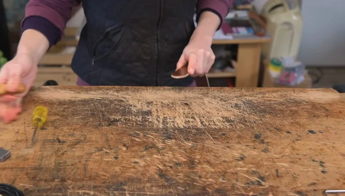 Mark stitching positions, including the buckle end.