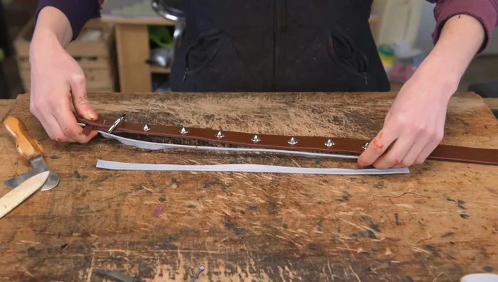 Glue piping to collar: Securely glue piping to the collar edge. Trim excess and make adjustments as needed.