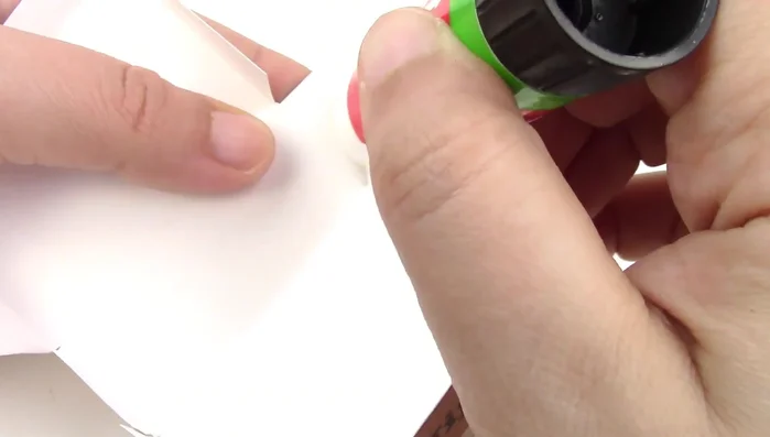 Glue the ends of the box together.