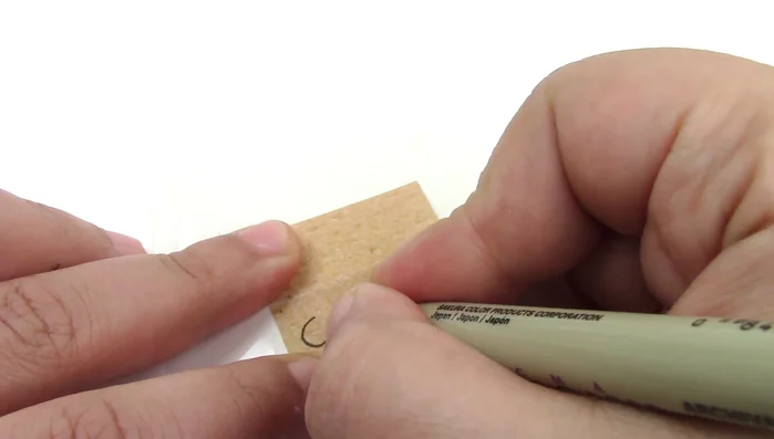 Create labels for the catnip toys using cardboard paper. Seal with glue or a stapler.