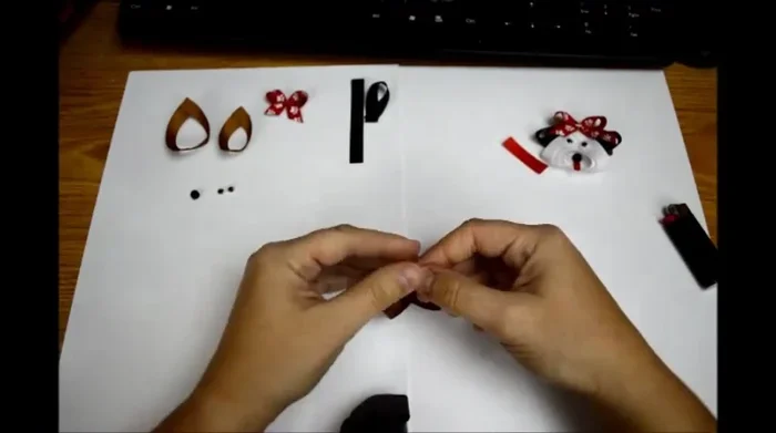 Create the body: Glue the largest pieces (3-inch) together, then nest the 2 1/2-inch and 2-inch pieces in the center, ensuring points line up.