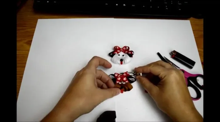 Attach alligator clip: Secure a partially lined alligator clip to the back for easy attachment.