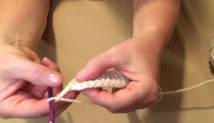 Create the lacy edge: chain three, skip the next stitch, single crochet in the next stitch, repeat around. Join to the first chain.