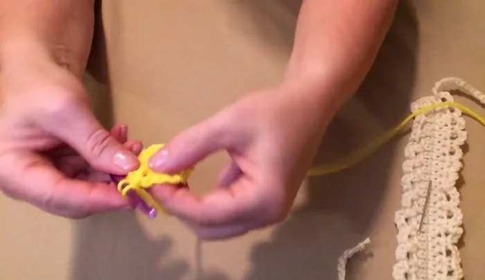 Finish the flower: Single crochet, 2 double crochets, single crochet in each chain-2 space. Repeat around. Fasten off, leaving a tail for sewing.