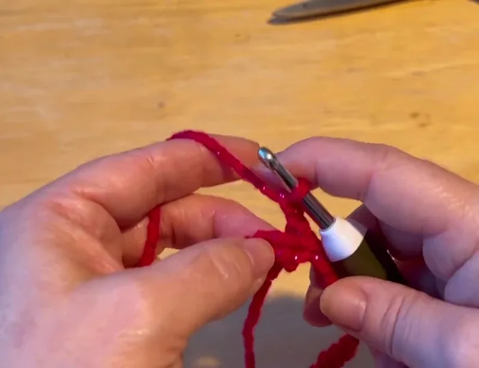 Continue with half double crochets in a spiral, working 12 rows on both sides of the hook for the body of the sweater.