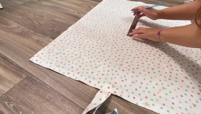 Sew horizontal lines to create pillow and bedding sections.
