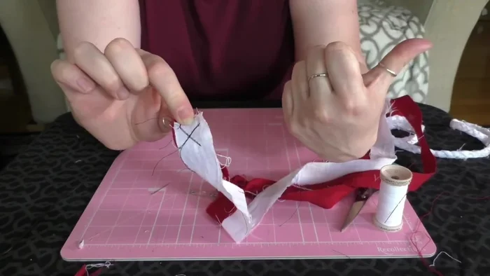 Braid the three strips together.