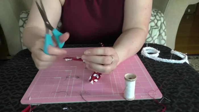 Trim excess threads.